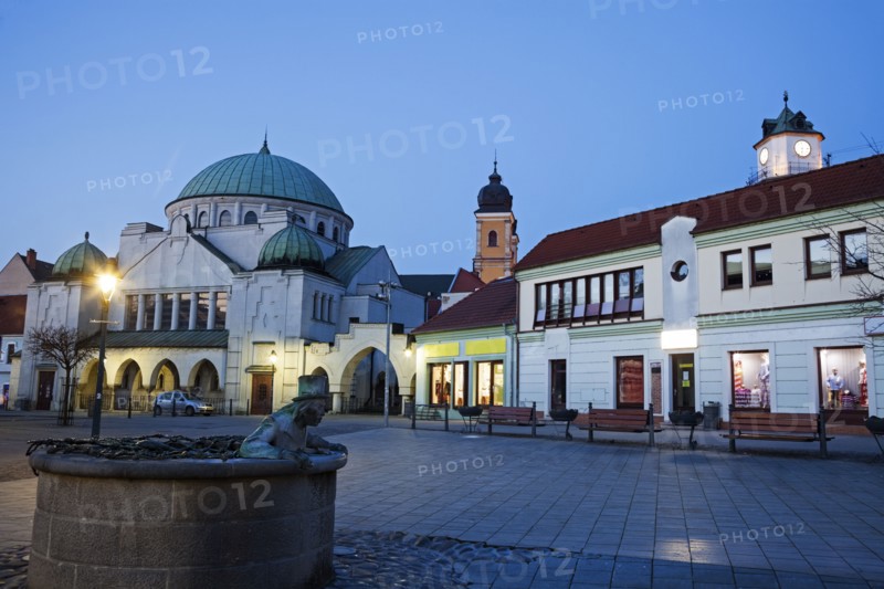 Buildings at town square at dusk