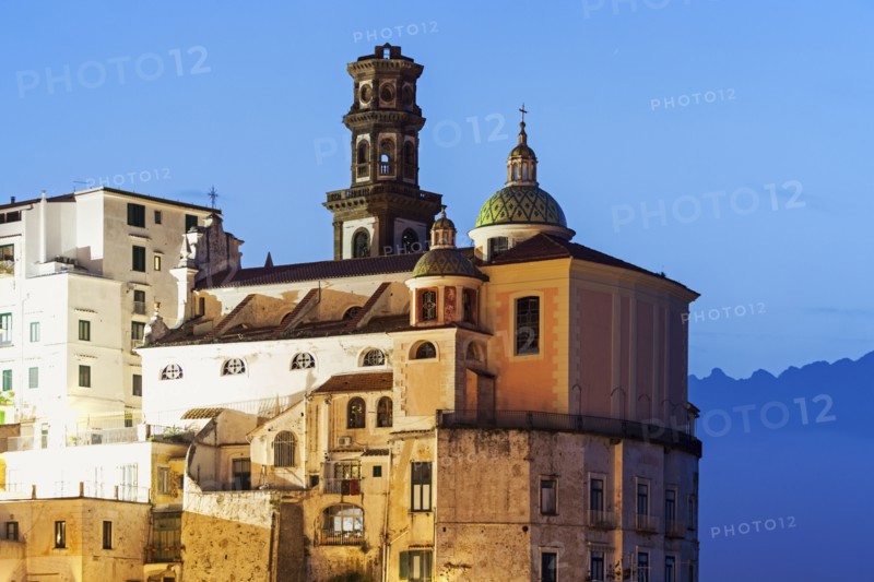 Townhouses and tower at dusk