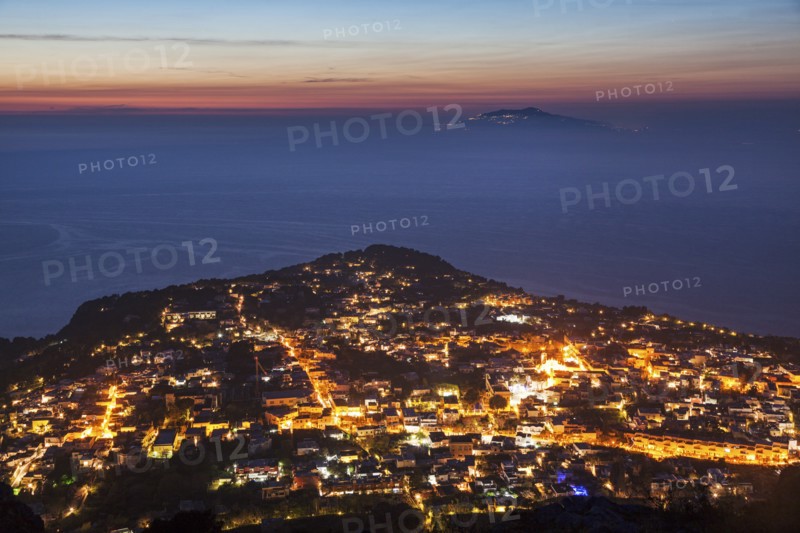 Illuminated cityscape at dusk