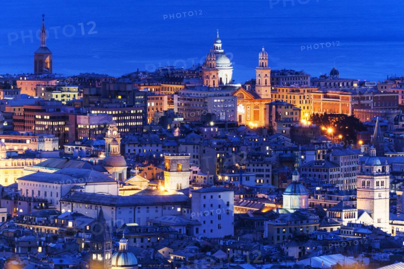 Cityscape with Santa Maria Church illuminated at dusk