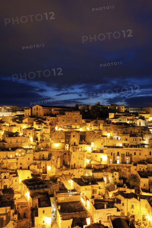 Illuminated city buildings at night
