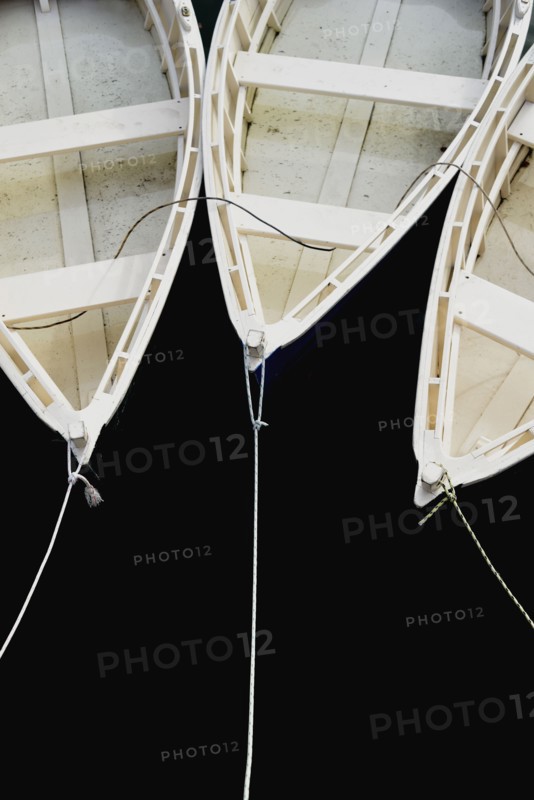 Three small rowboats