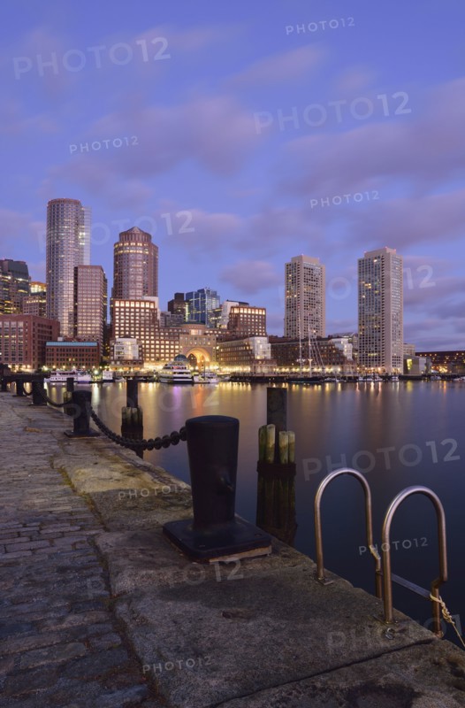 Waterfront reflected in Fort Point Channel at dawn