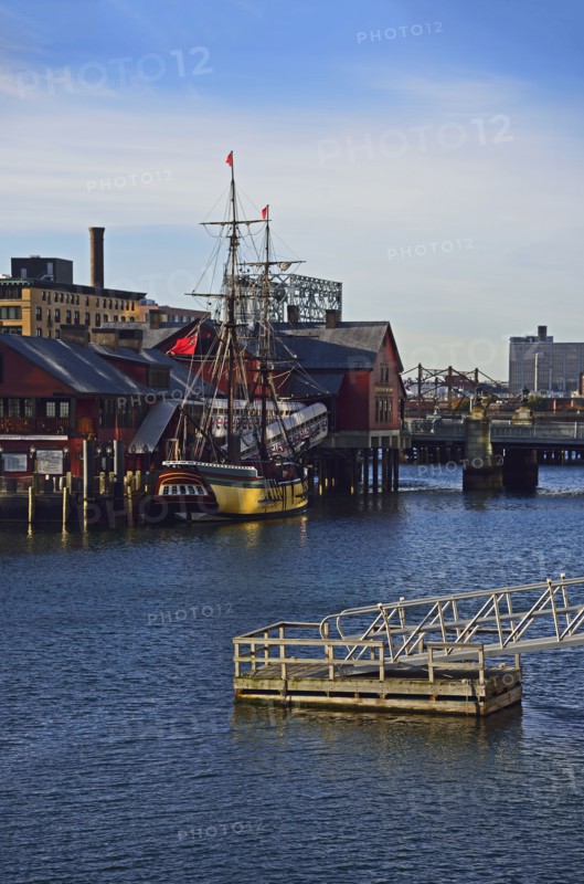 Tall ship moored in harbor