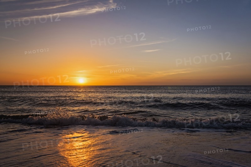 Beach and sea at sunset