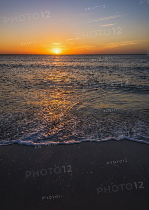 Beach and sea at sunset