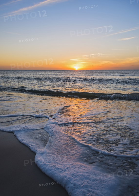 Beach and sea at sunset