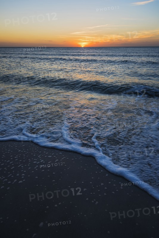 Beach and sea at sunset