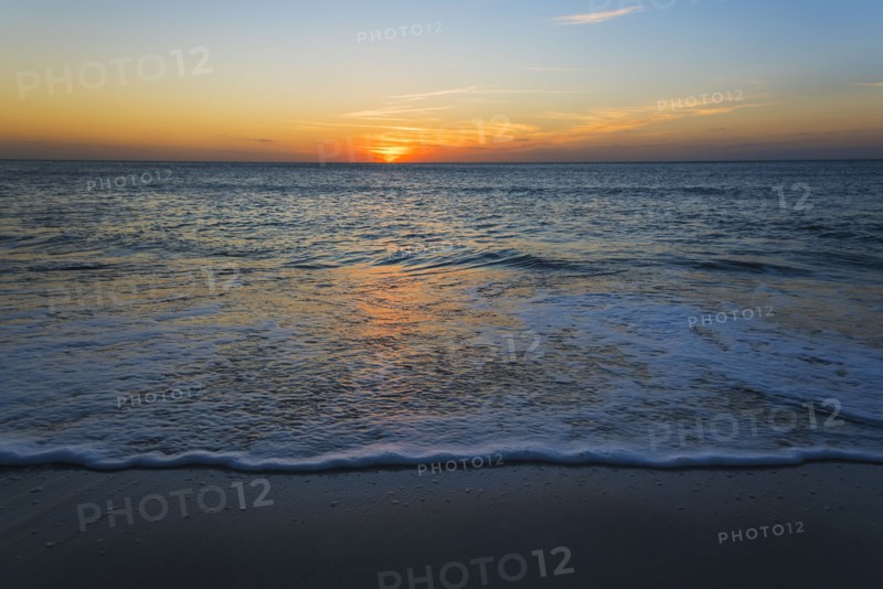 Beach and sea at sunset