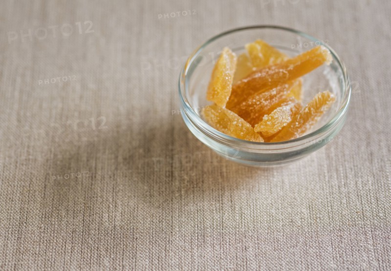 Candied ginger in glass bowl