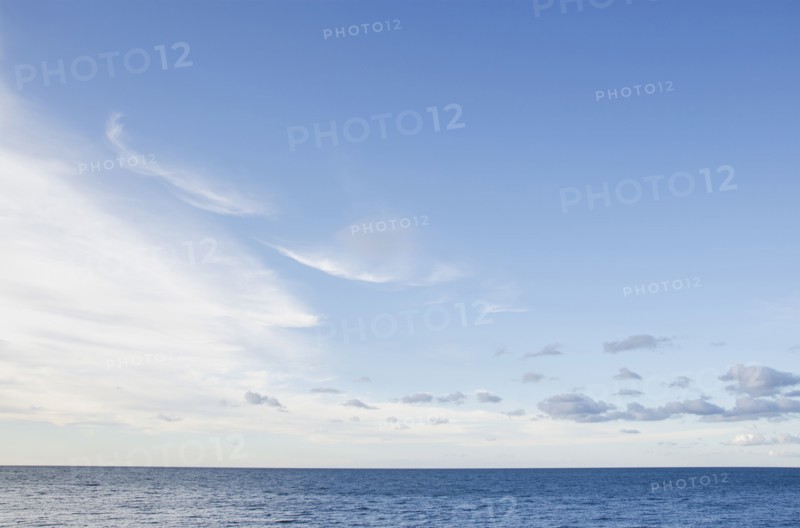 Sea with cloudy sky