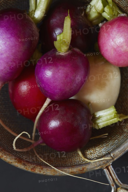Radishes in colander