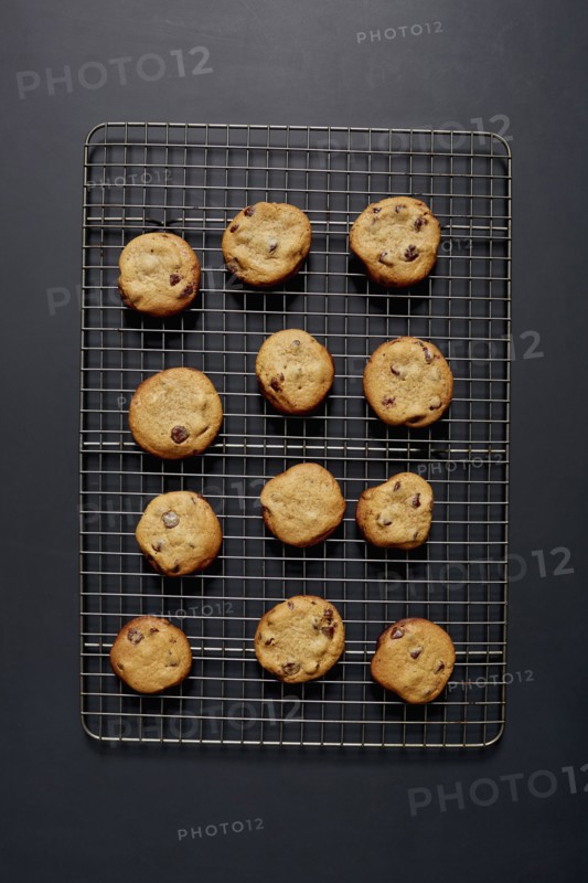 Baked chocolate cookies on cooling rack