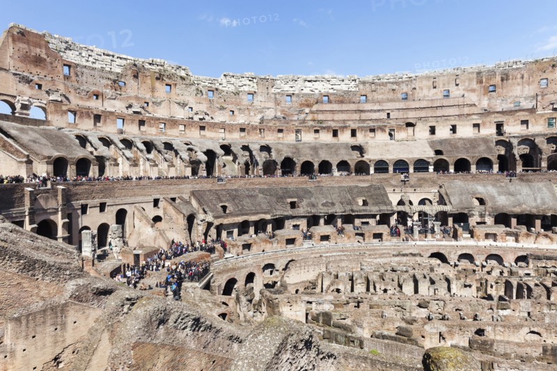 Ruins of Coliseum under blue sky