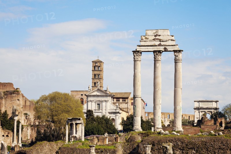 Columns of Roman Forum against blue sky