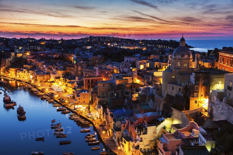 Illuminated townscape on Marina Corricella on Procida Island