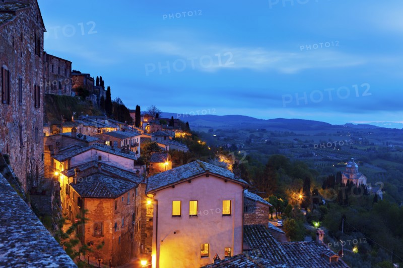 Montepulciano, Illuminated houses on rocks under cloudy sky