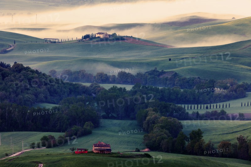 Rolling landscape with farmhouse