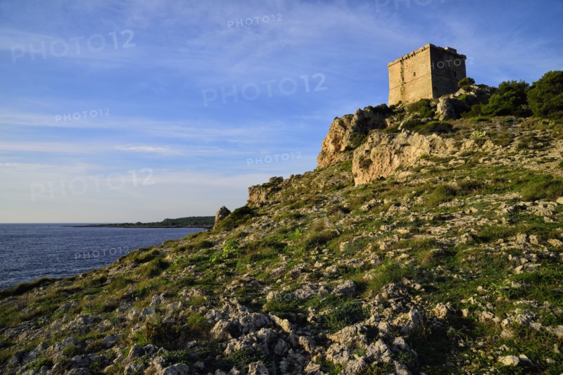 Medieval Torre dell'Alto tower on coastline