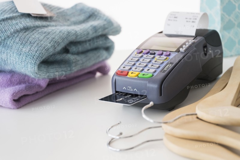 Credit card reader on counter.