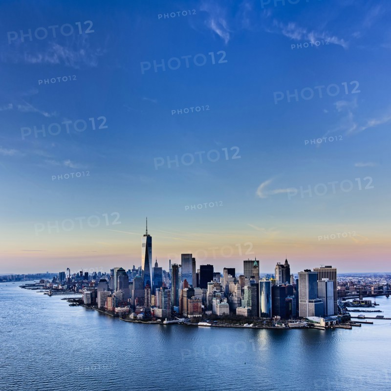 Urban skyline at dusk. USA, New York, New York City.