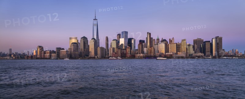 Urban skyline at dusk. USA, New York, New York City.