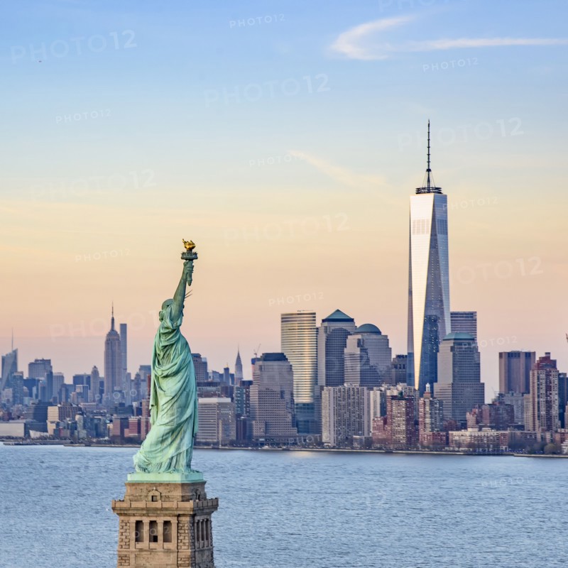 Statue of Liberty and One World Trade Centre. USA, New York, New York City.