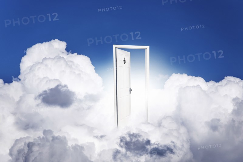 Opened door in clouds.