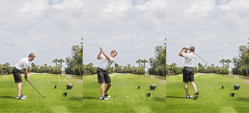 Man hitting ball with golf club