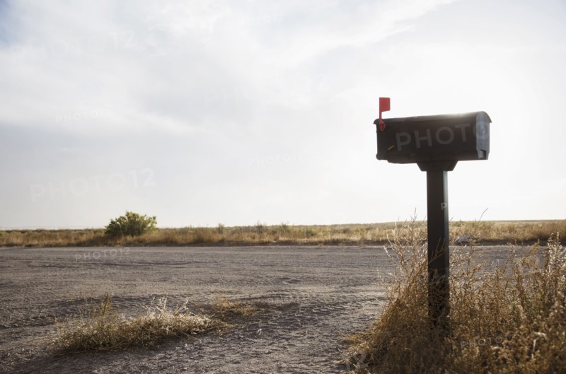 Mailbox by empty dirt road