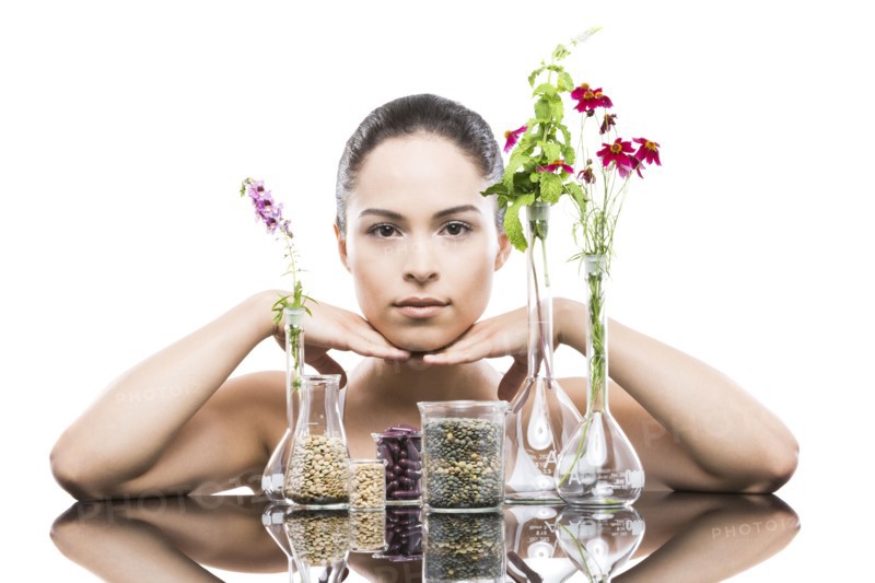 Young woman with vases in foreground