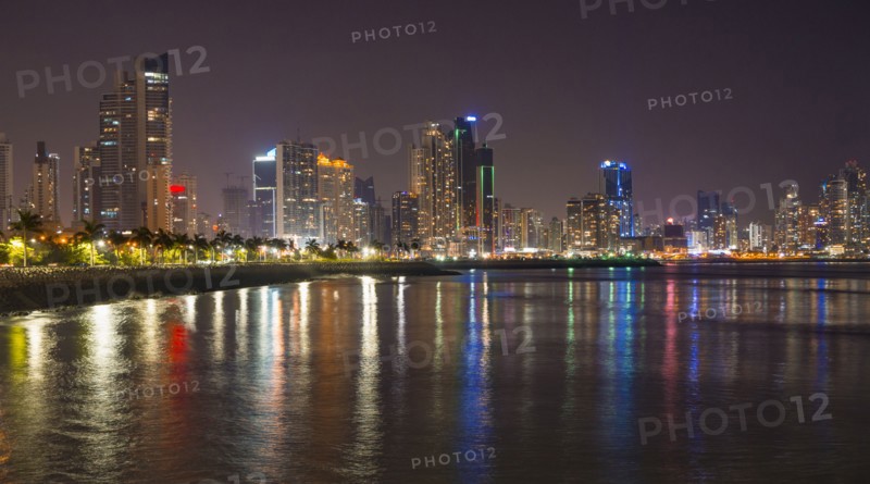 Illuminated cityscape at night