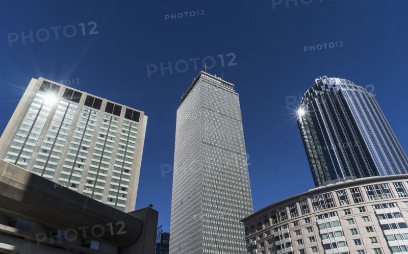 Modern skyscrapers in financial district on sunny day