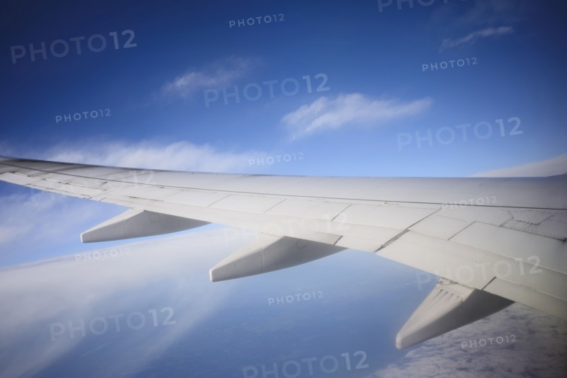 Cropped image of airplane in sky