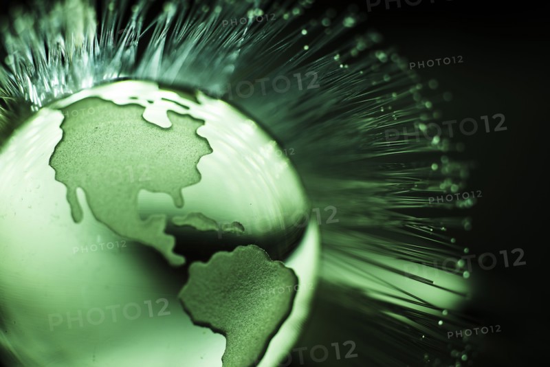 Illustration of fiber optics over globe.