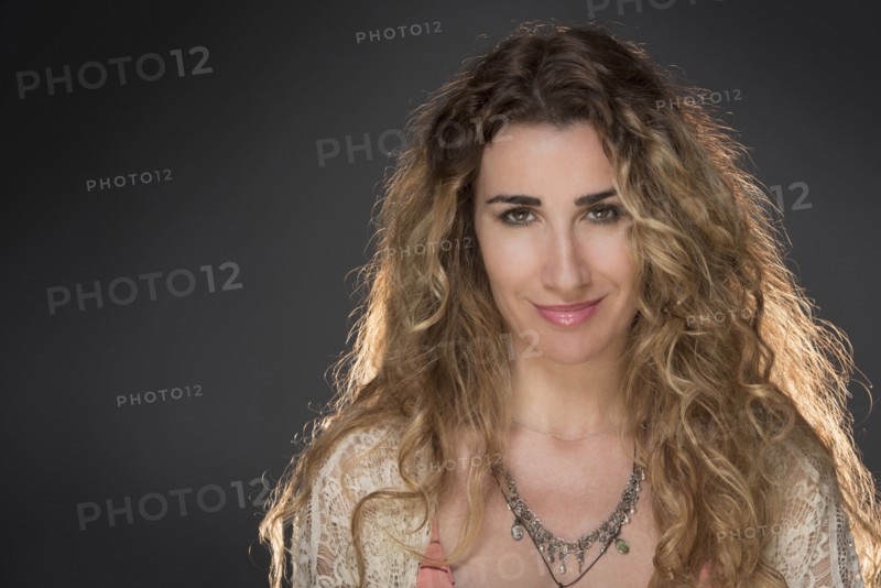 Portrait of beautiful woman with long blonde hair.