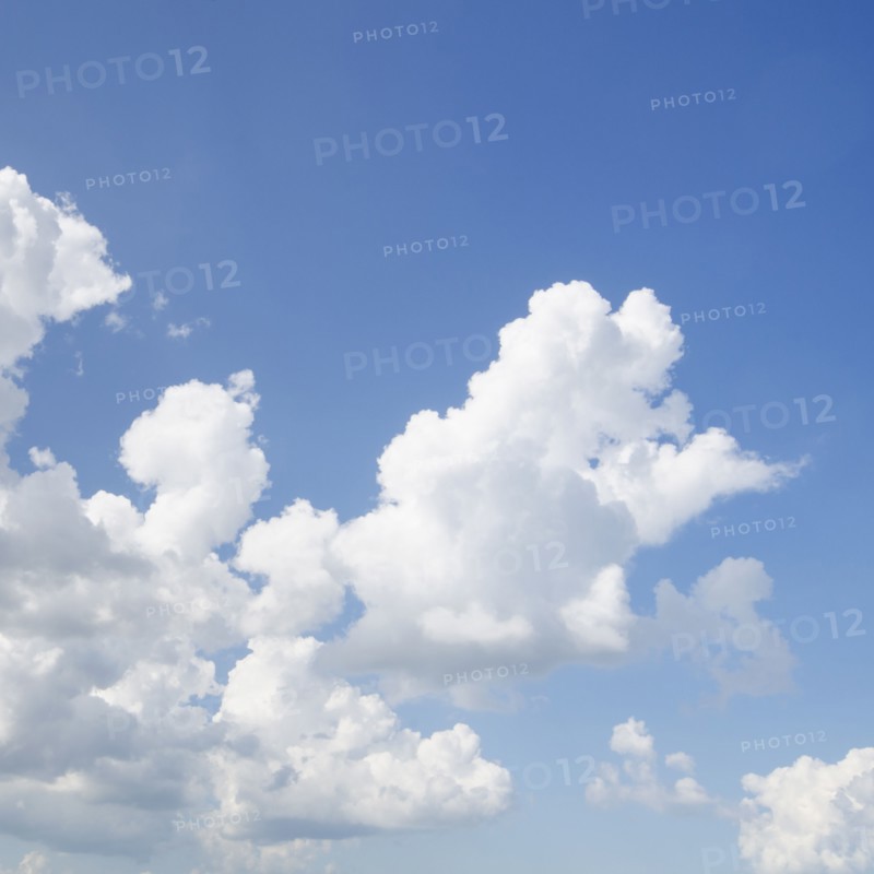 Cumulus clouds in blue sky