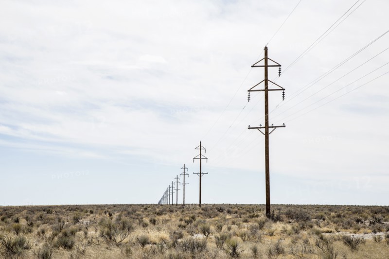 Electricity pylons in desert, Colorado