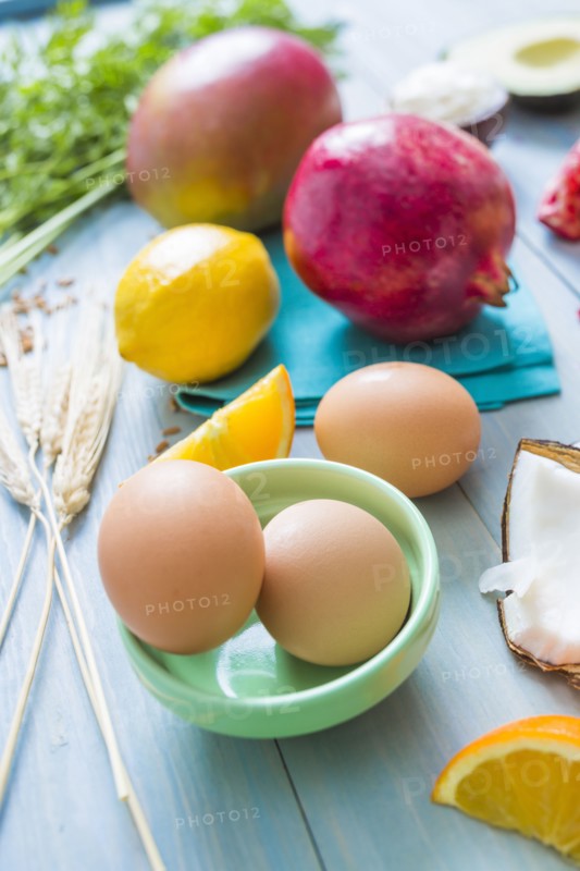 Eggs, oranges and pomegranates
