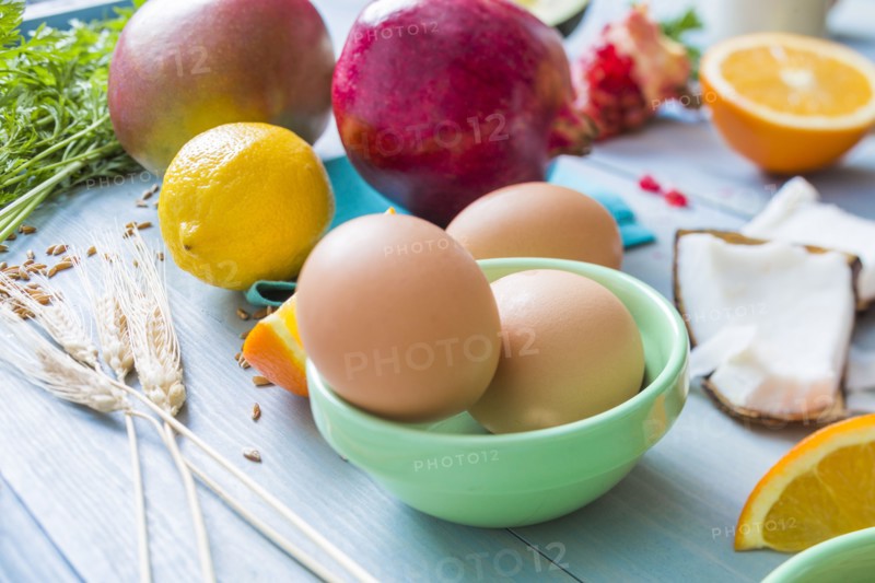 Eggs, oranges and pomegranates