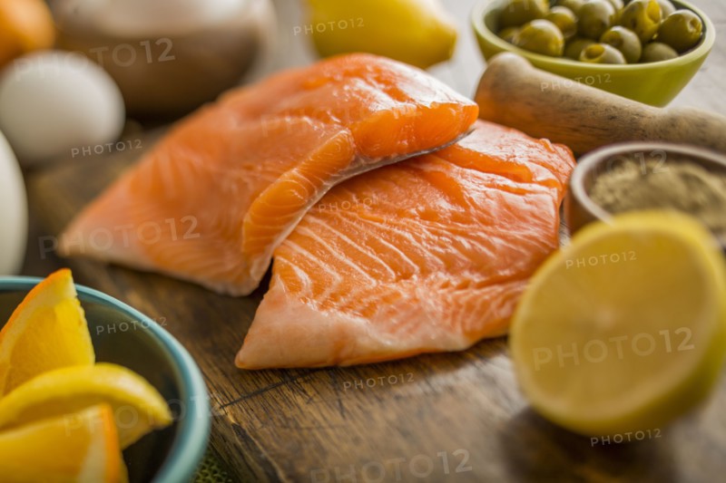 Fresh slices of salmon and lemon