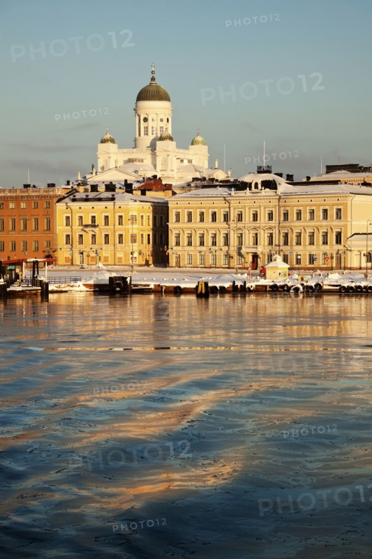 Finland, Helsinki, Harbor and cathedral at sunset