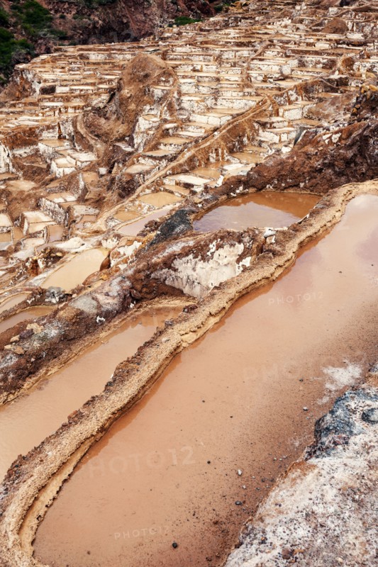 Peru, Cuzco, Sacred Valley, Maras, Aerial view of village with salt pools