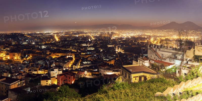 Italy, Campania, Naples, Panorama of city at sunrise
