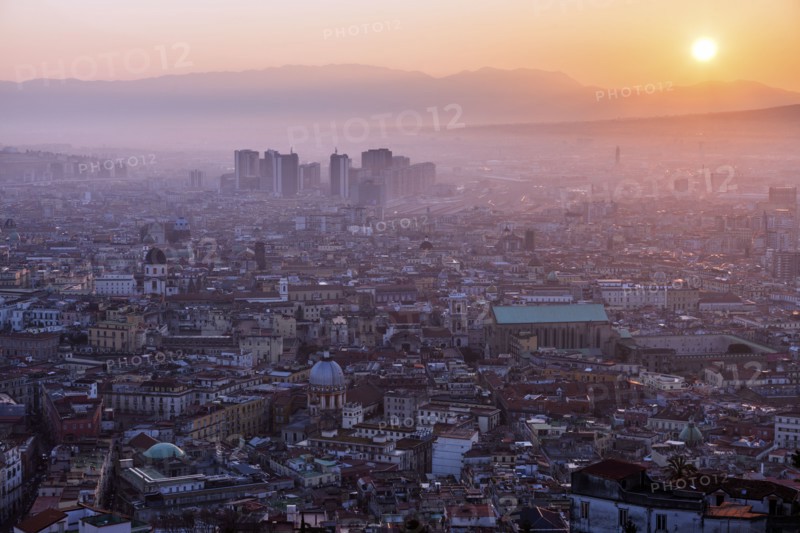 Italy, Campania, Naples, Cityscape at sunrise