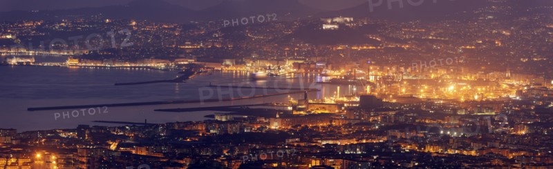 Italy, Campania, Naples, Panorama of city at night