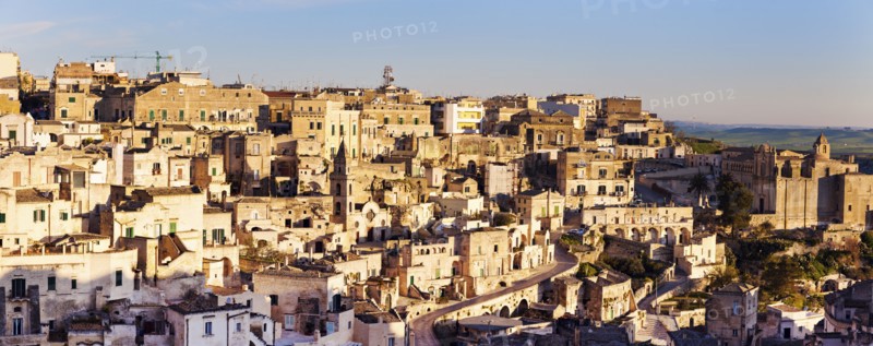 Italy, Basilicata, Matera, Panorama of old town at sunset