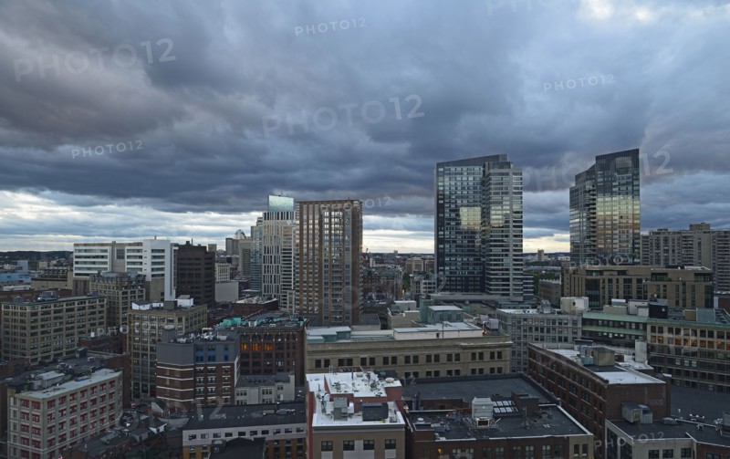 Massachusetts, Boston, City skyline with stormy sky