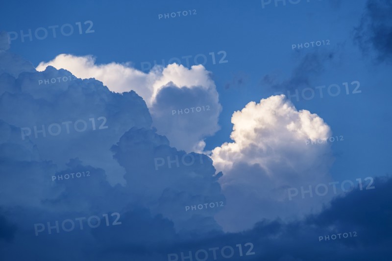Cumulus clouds on sky.