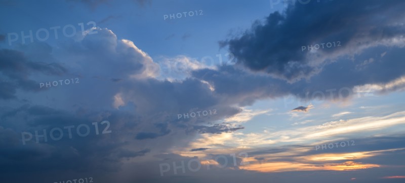 Clouds on sky at sunset.